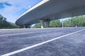 Asphalt roads and city buildings under the overpass, automobile advertising road material.